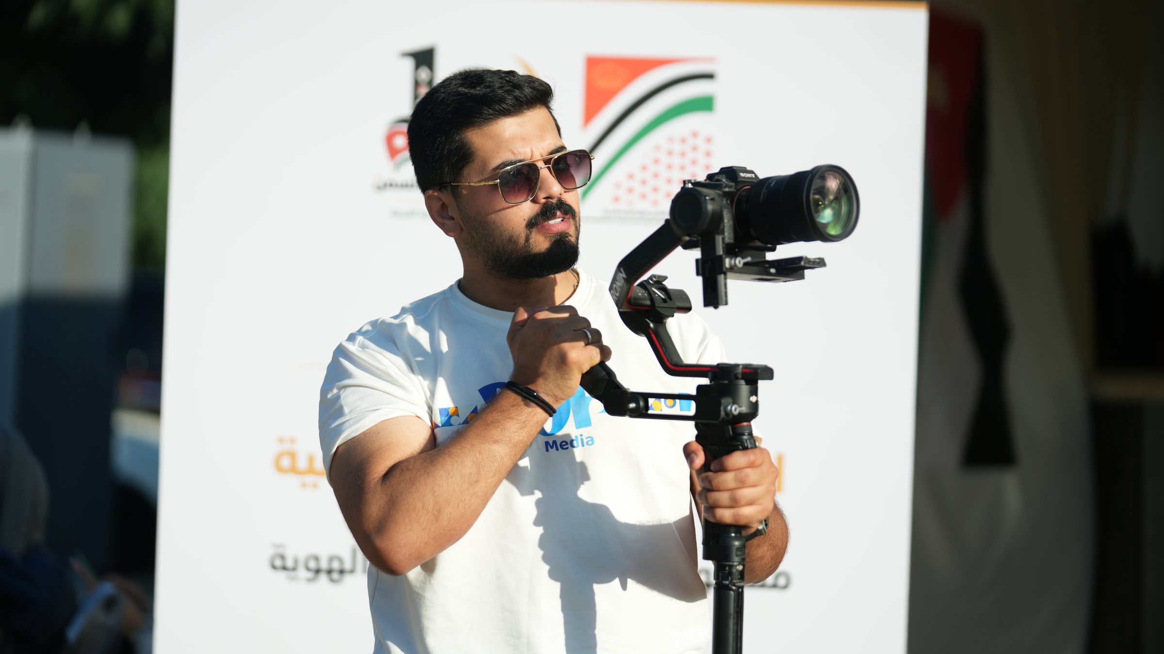Asef Alhmoud on set with a gimbal camera